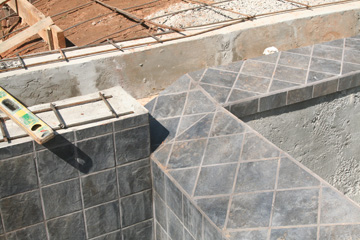 View of tile edge of swimming pool