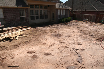 Yard pre-graded for pool placement