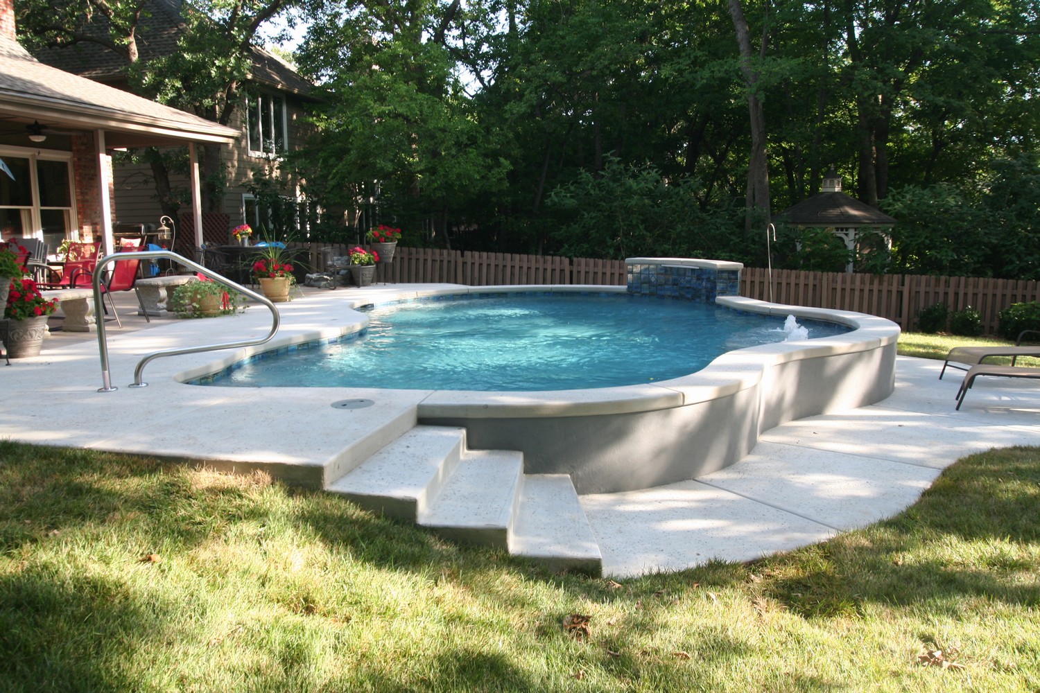 Free-form pools by Atlantis Pools & Spas Inc, Tulsa, Ok.