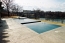 Rectangle vanishing edge pool with a motorize cover.