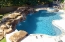 Free from pool and spa combination with a boulder water feature.
