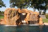 G.F.R.C. waterfall and grotto with a slide built into it.