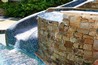 View of water flowing down an all tiled slide