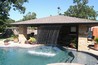 This is a rain curtain spilling into a swimming pool