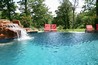 Infinity edge pool with a boulder waterfall.